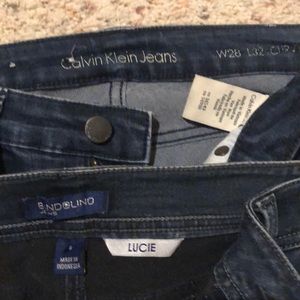 2 gently worn pairs of blue jeans.